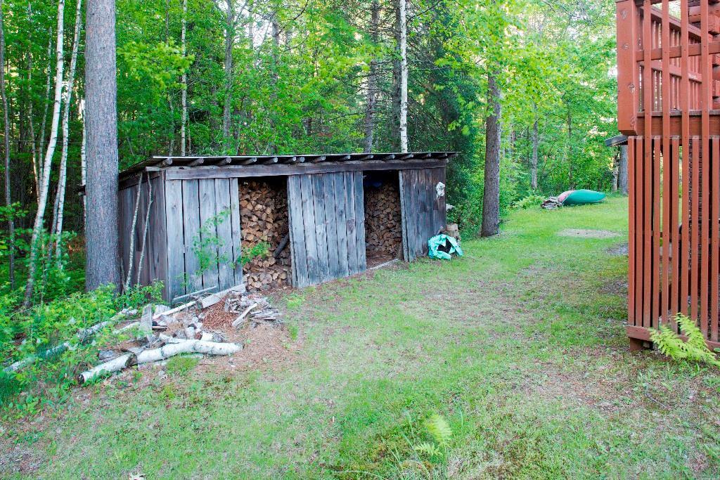 743 Cardville Road Greenbush, ME 04418 - Photo 30 of 34 Woodshed behind the house