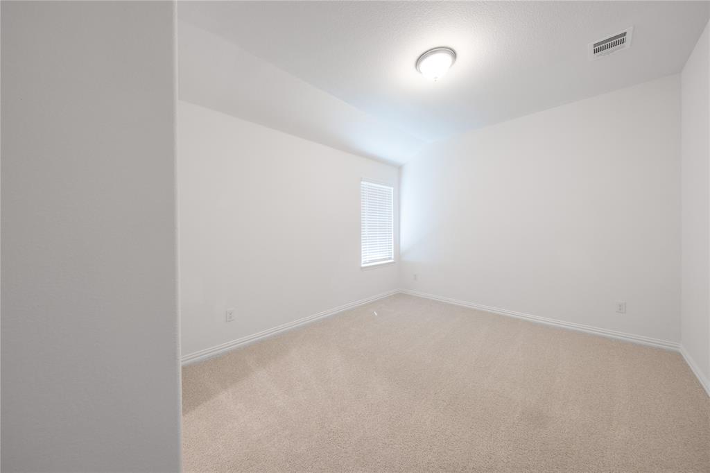 3333 Longfellow Avenue Anna, TX 75409 - Photo 20 of 35 a view of an empty room and a window