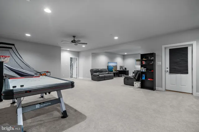 a bathroom with a double vanity sink mirror and shower