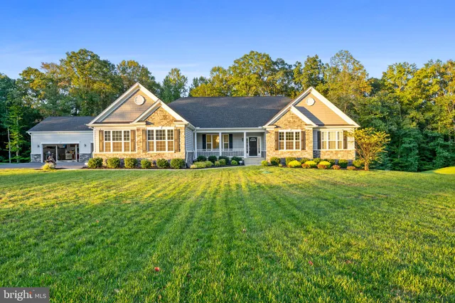 a view of backyard with a chair