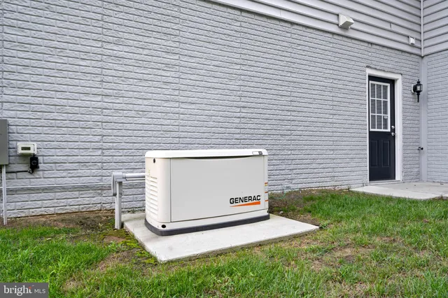 a view of a house with a yard and garage