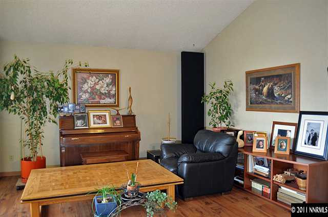 3485 Gulling Road Reno, NV 89503 - Photo 3 of 8 a living room with furniture and a potted plant