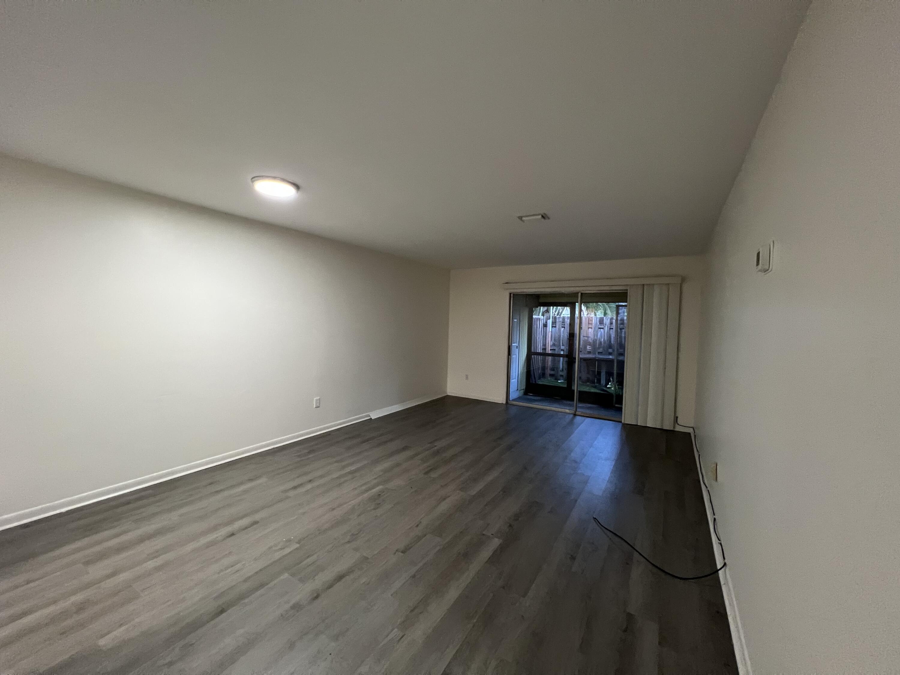 17355 Bush Road, Unit E Jupiter, FL 33458 - Photo 2 of 21 IMG_3543