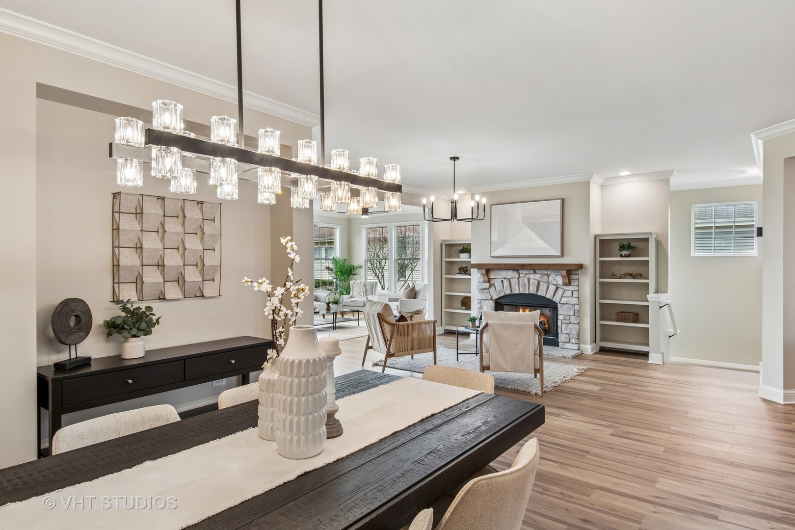 3607 Greystone Avenue Naperville, IL 60564 - Photo 15 of 59 a room with fireplace furniture and a chandelier