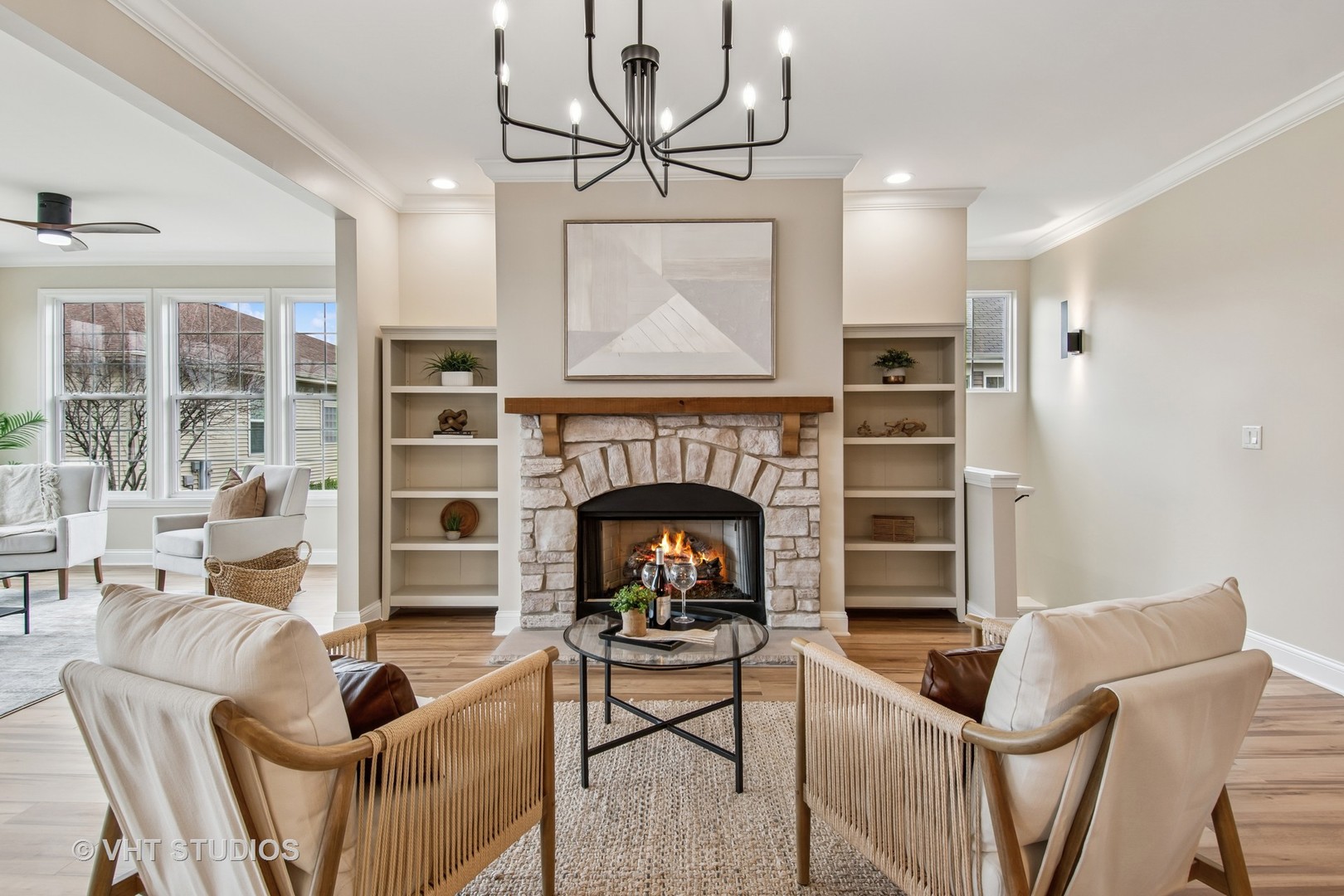 3607 Greystone Avenue Naperville, IL 60564 - Photo 17 of 59 a living room with furniture a rug and a fireplace