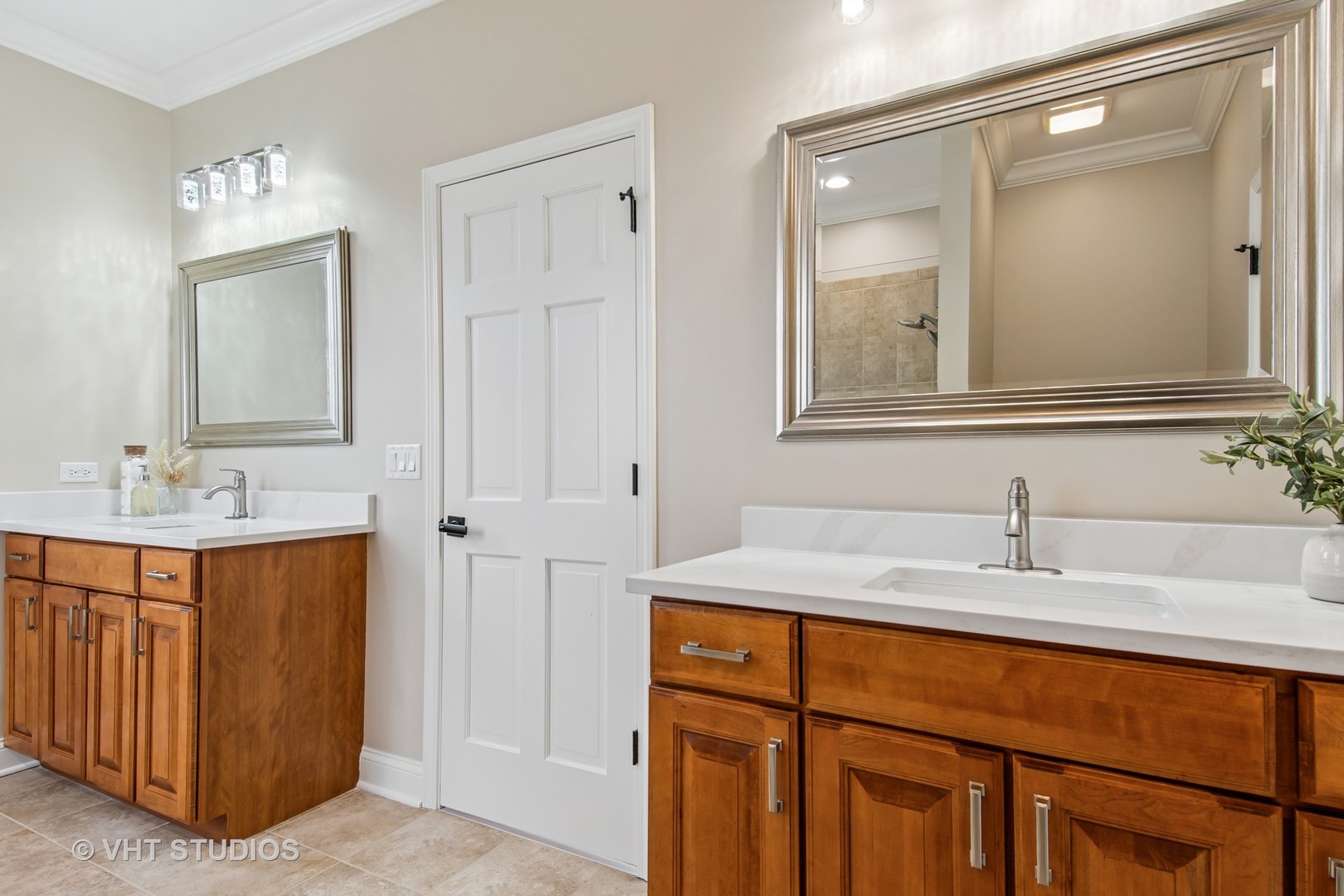 3607 Greystone Avenue Naperville, IL 60564 - Photo 23 of 59 a bathroom with a sink and a mirror