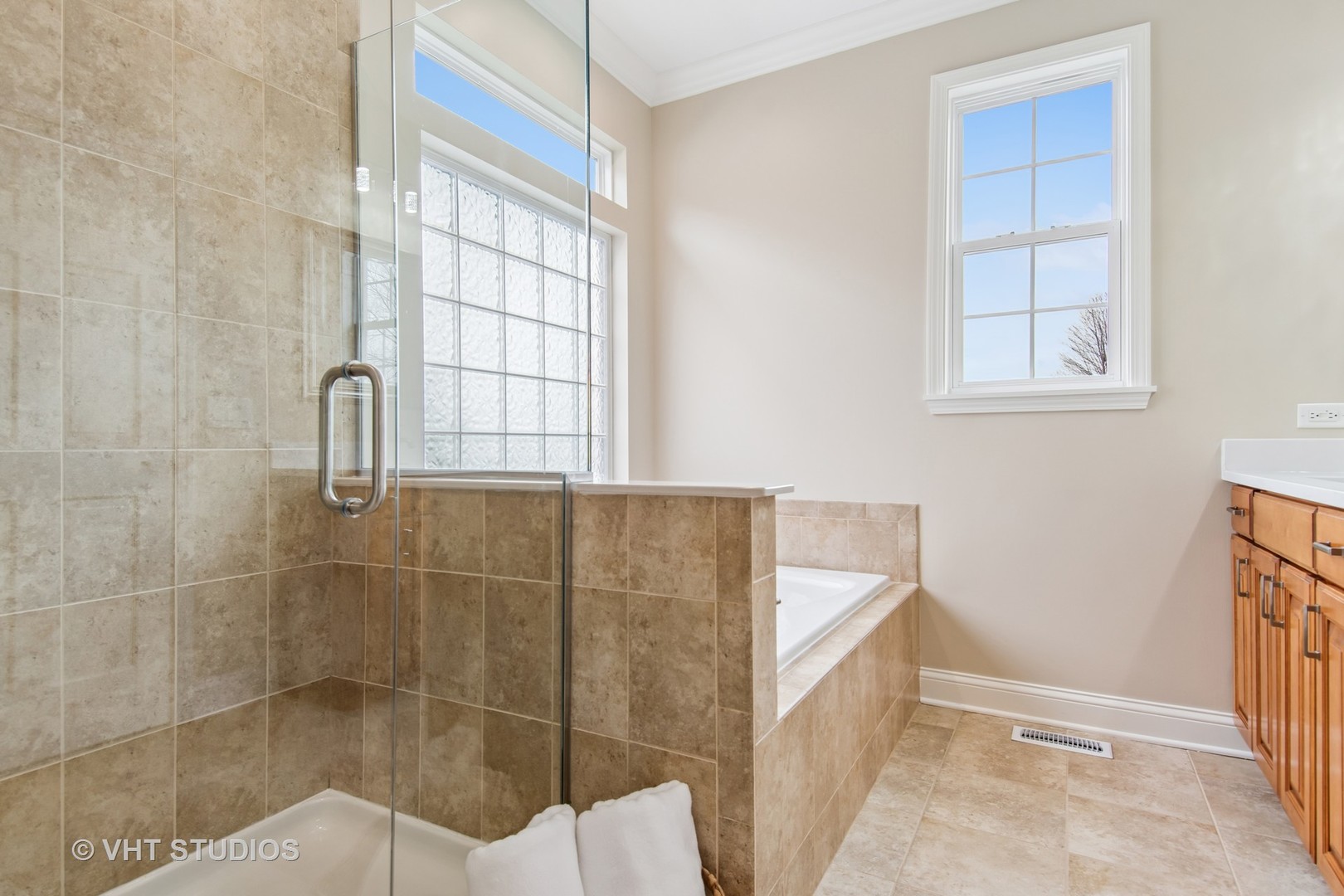 3607 Greystone Avenue Naperville, IL 60564 - Photo 24 of 59 a bathroom with a bathtub and shower