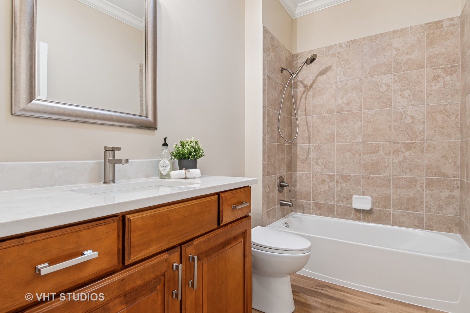 3607 Greystone Avenue Naperville, IL 60564 - Photo 27 of 59 a bathroom with a sink a toilet and shower