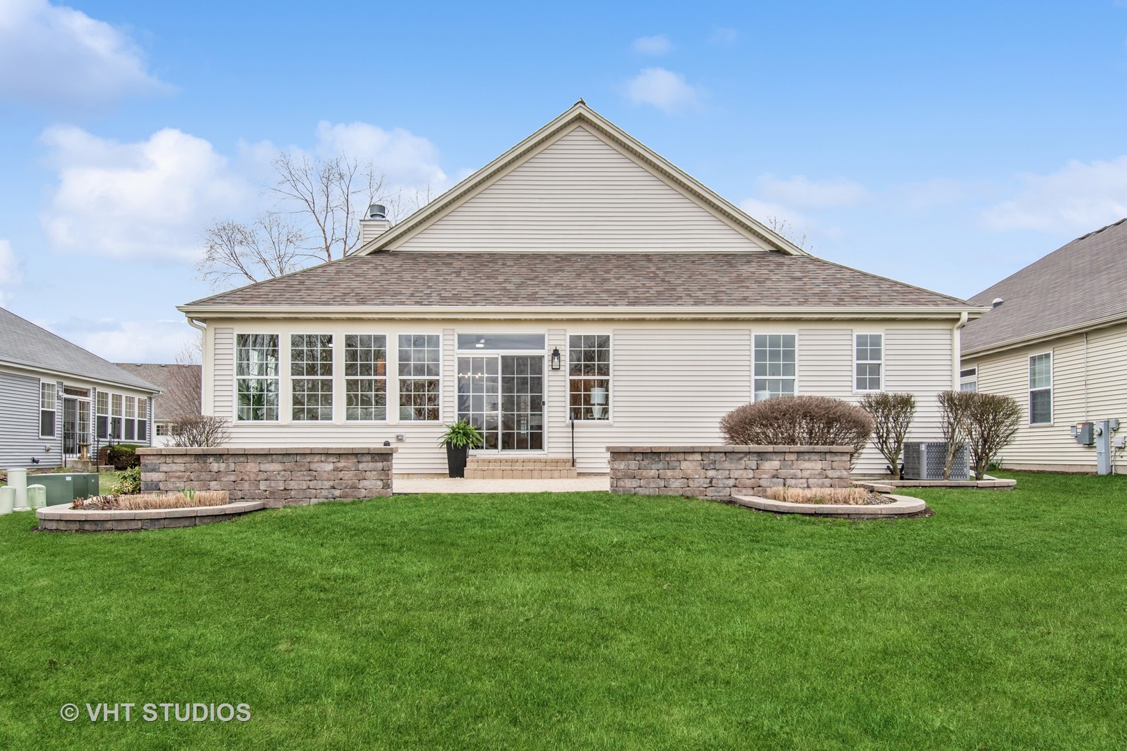 3607 Greystone Avenue Naperville, IL 60564 - Photo 36 of 59 a front view of house with a garden and patio