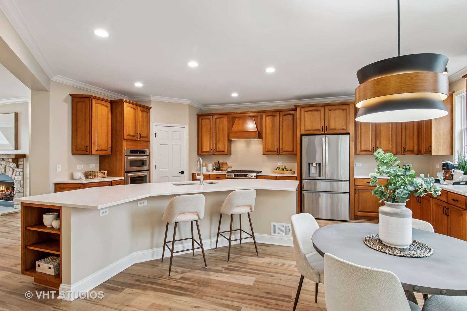 3607 Greystone Avenue Naperville, IL 60564 - Photo 9 of 59 a kitchen with a refrigerator and a stove top oven