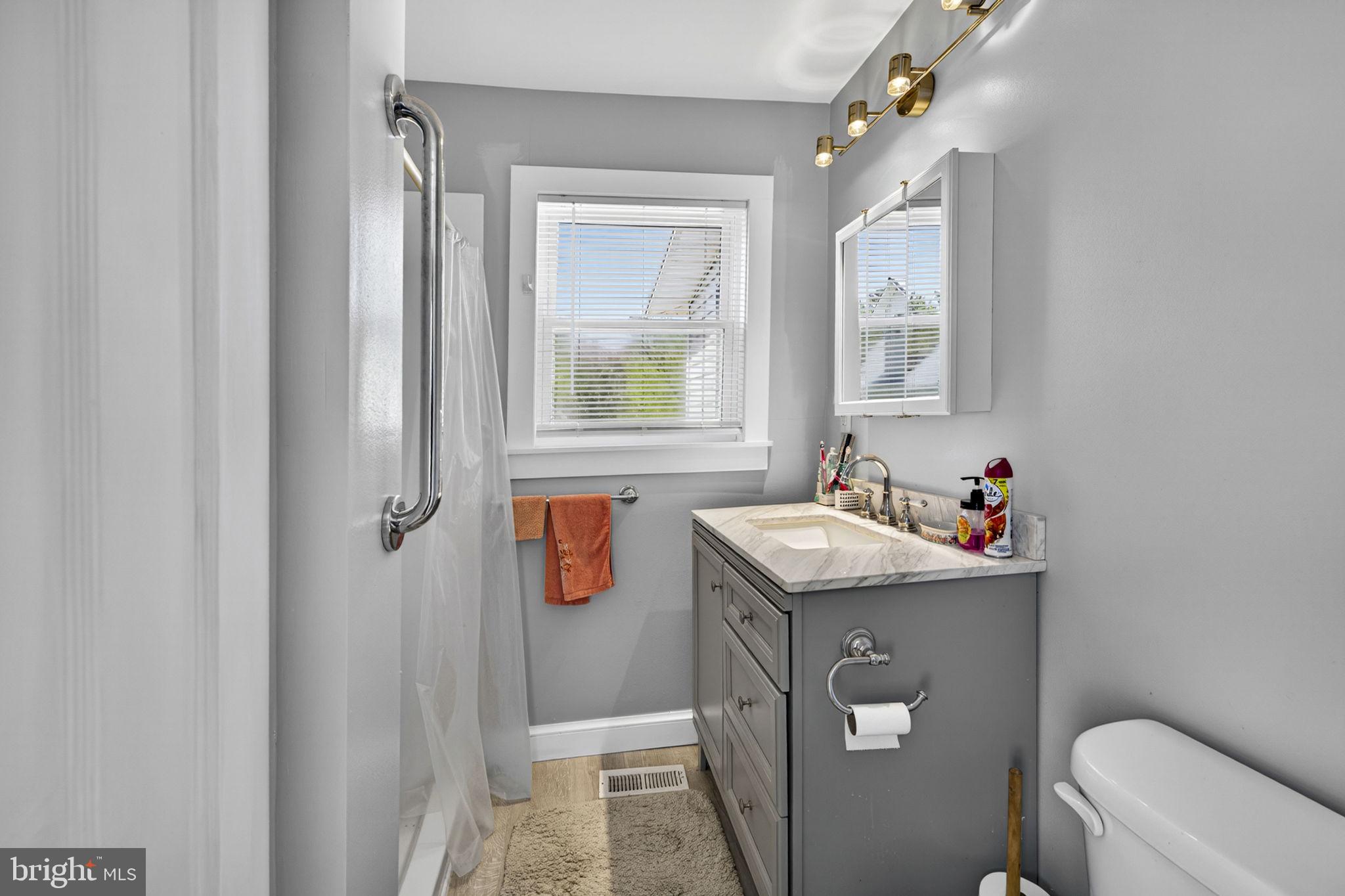 4809 Coles Point Road Hague, VA 22469 - Photo 23 of 49 Bright and airy modern bathroom retreat.