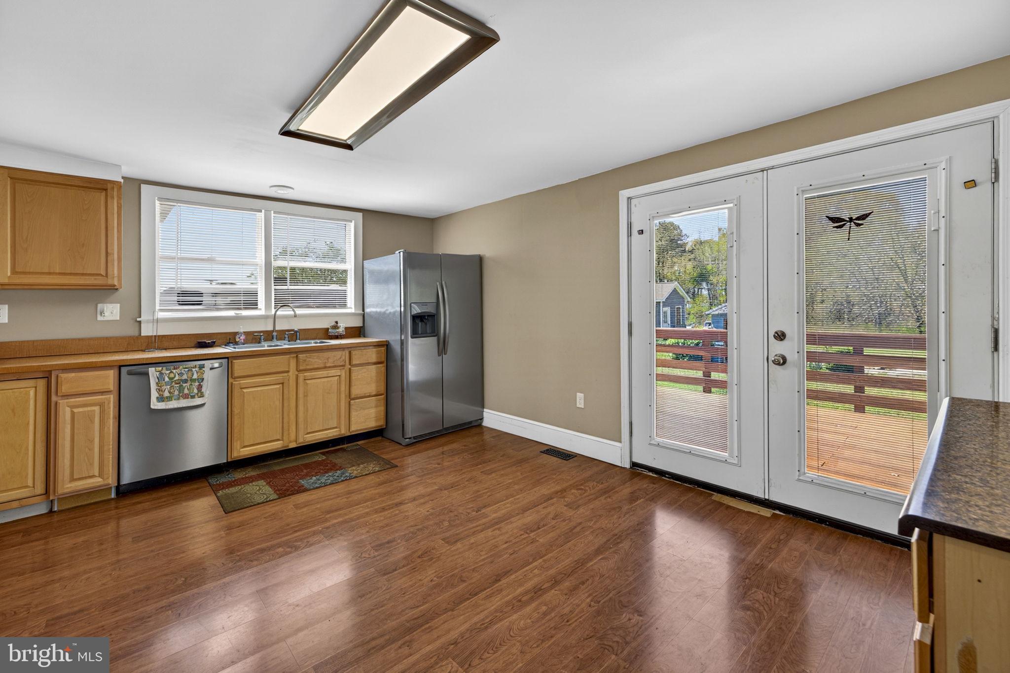 4809 Coles Point Road Hague, VA 22469 - Photo 24 of 49 Bright kitchen with outdoor access.