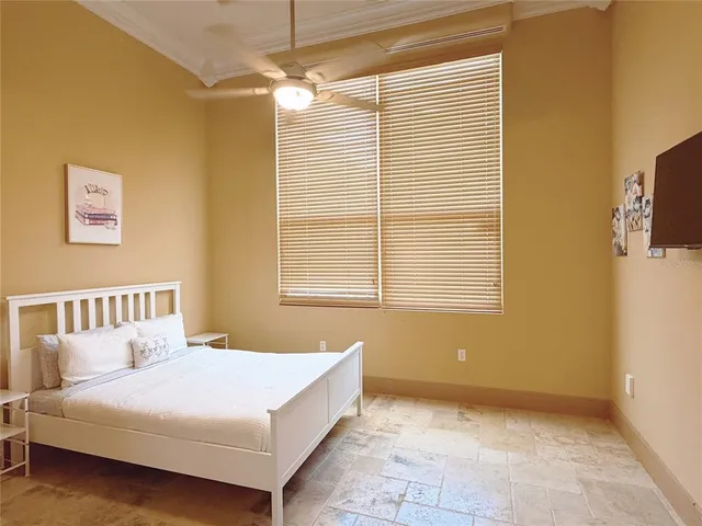 a bathroom with a sink mirror and vanity