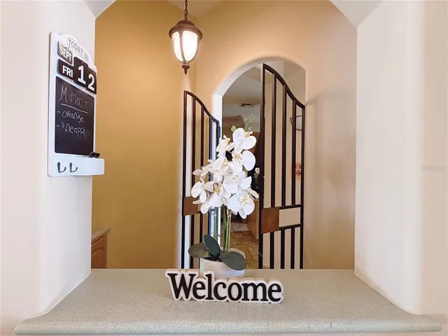 a spacious bedroom with a large bed and a window