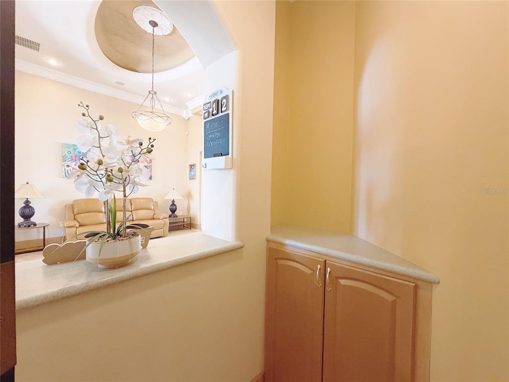 4421 Reaves Road Kissimmee, FL 34746 - Photo 39 of 100 a bathroom with a sink and a mirror