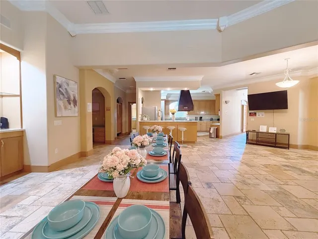 an aerial view of a house with outdoor space