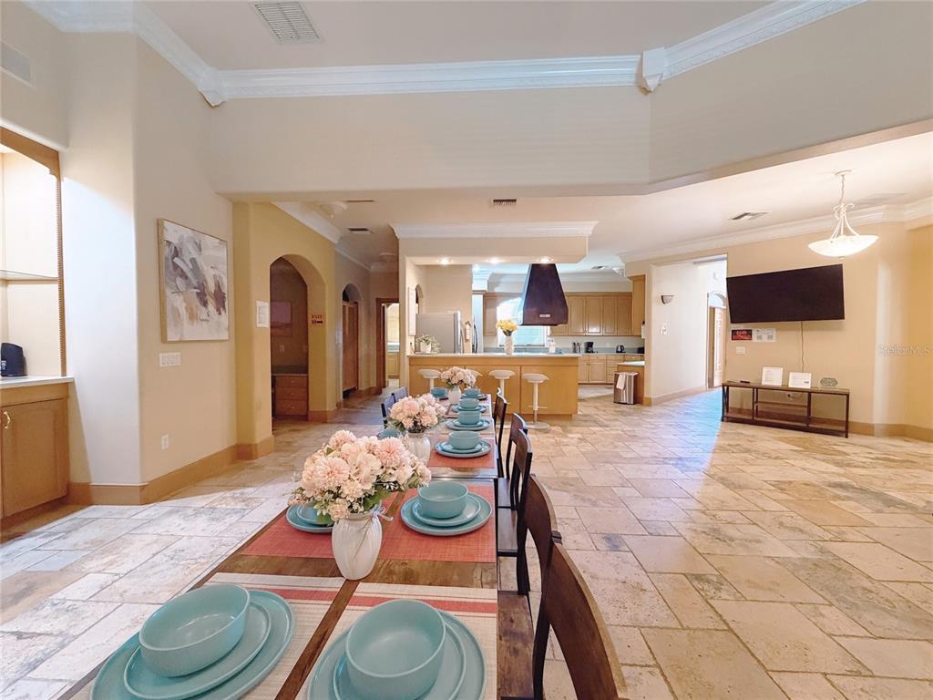 4421 Reaves Road Kissimmee, FL 34746 - Photo 49 of 100 a view of a dining room with furniture and wooden floor