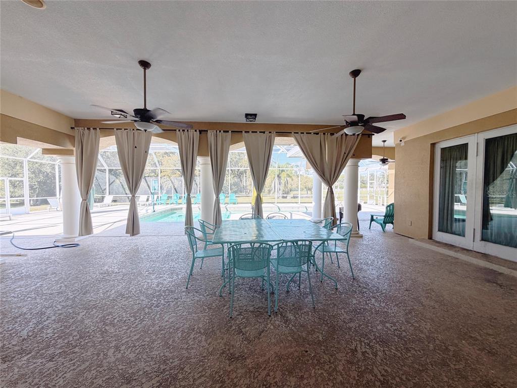 4421 Reaves Road Kissimmee, FL 34746 - Photo 72 of 100 a view of a dining room with furniture window and outside view