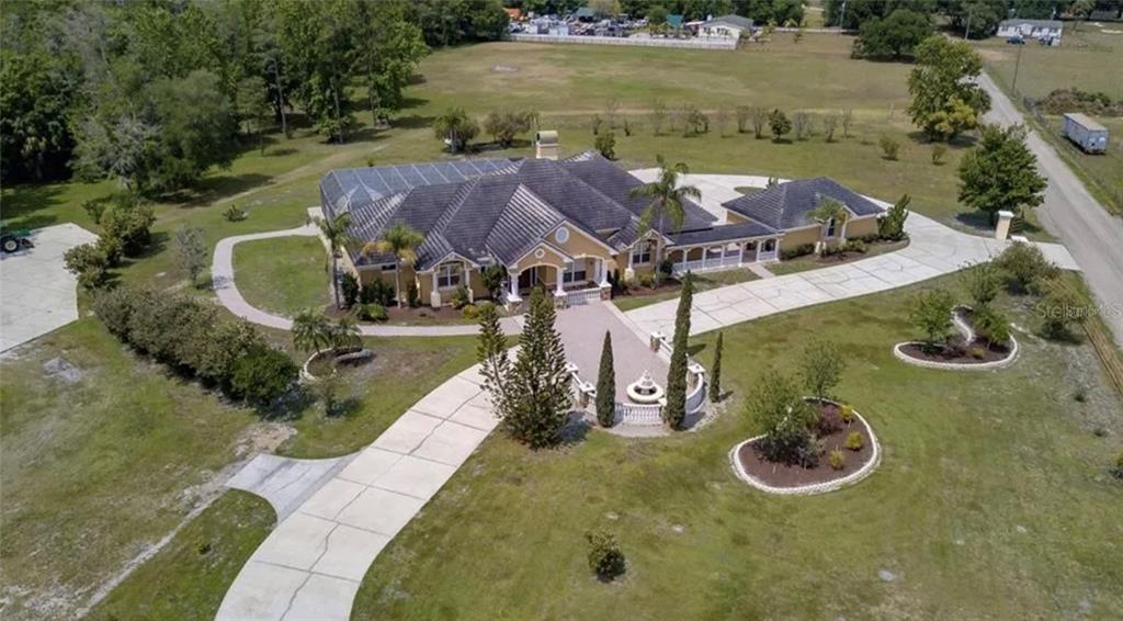 4421 Reaves Road Kissimmee, FL 34746 - Photo 97 of 100 an aerial view of a house with outdoor space