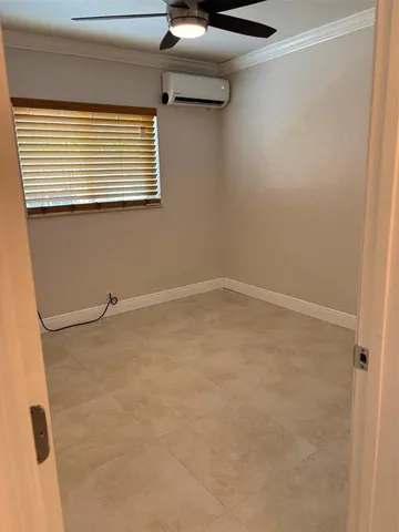 a view of a room with a window