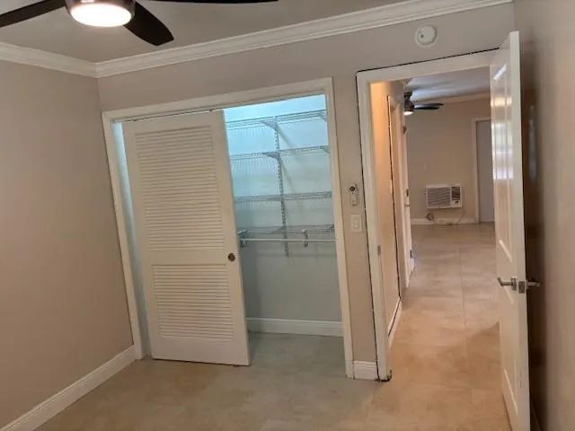 a view of an empty room with a window