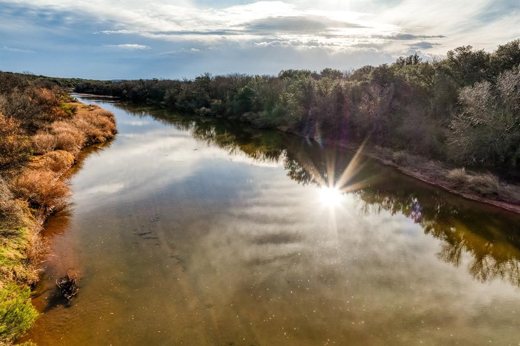 a view of river covered by trees