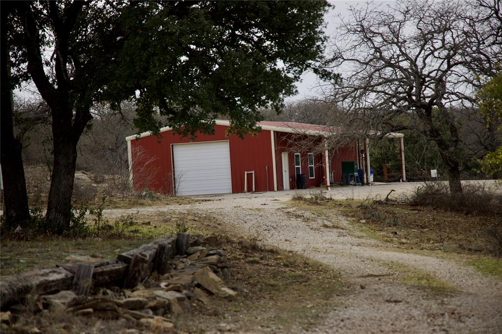Tbd Reeves Road Graham, TX 76450 - Photo 36 of 40 a front view of a house with a yard