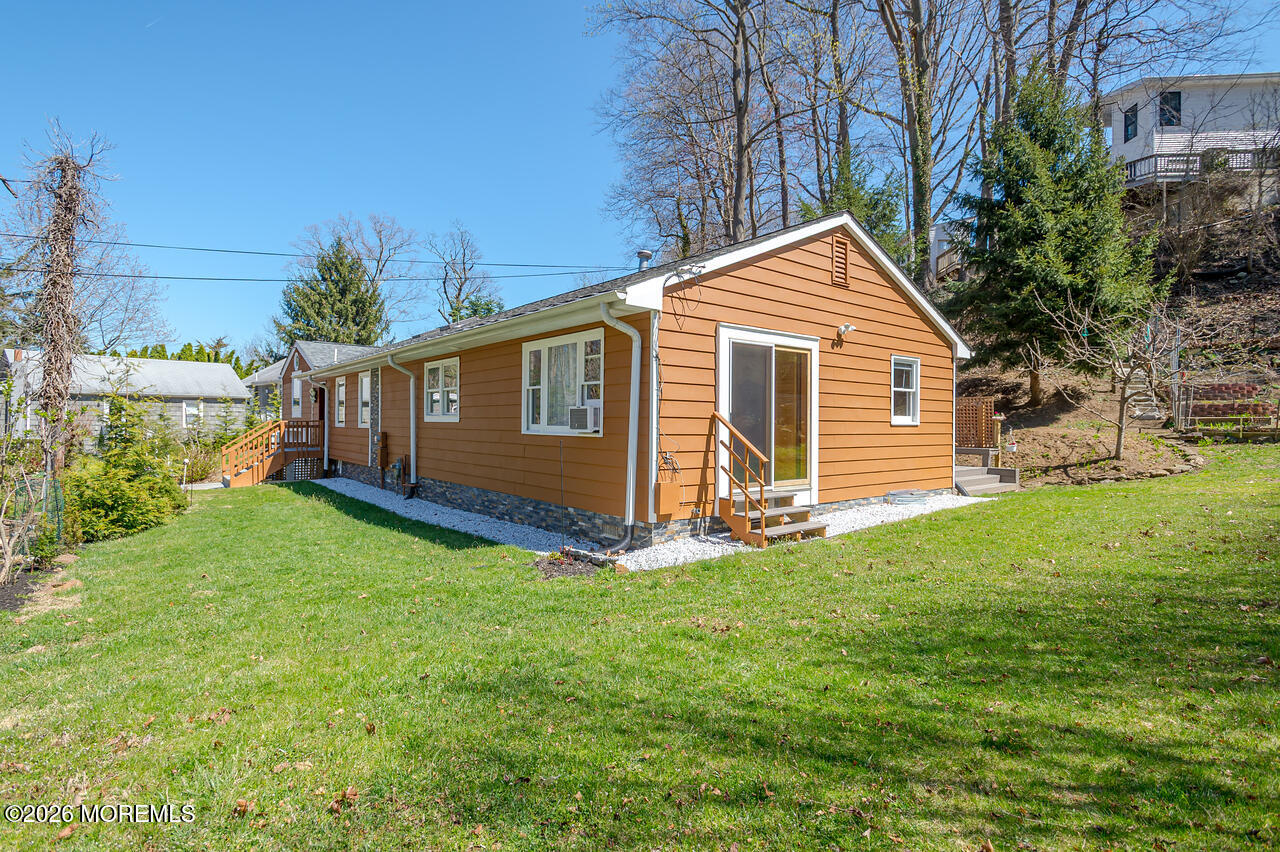 111 Valley Avenue Highlands, NJ 07732 - Photo 3 of 56 a view of a house with a yard and sitting area