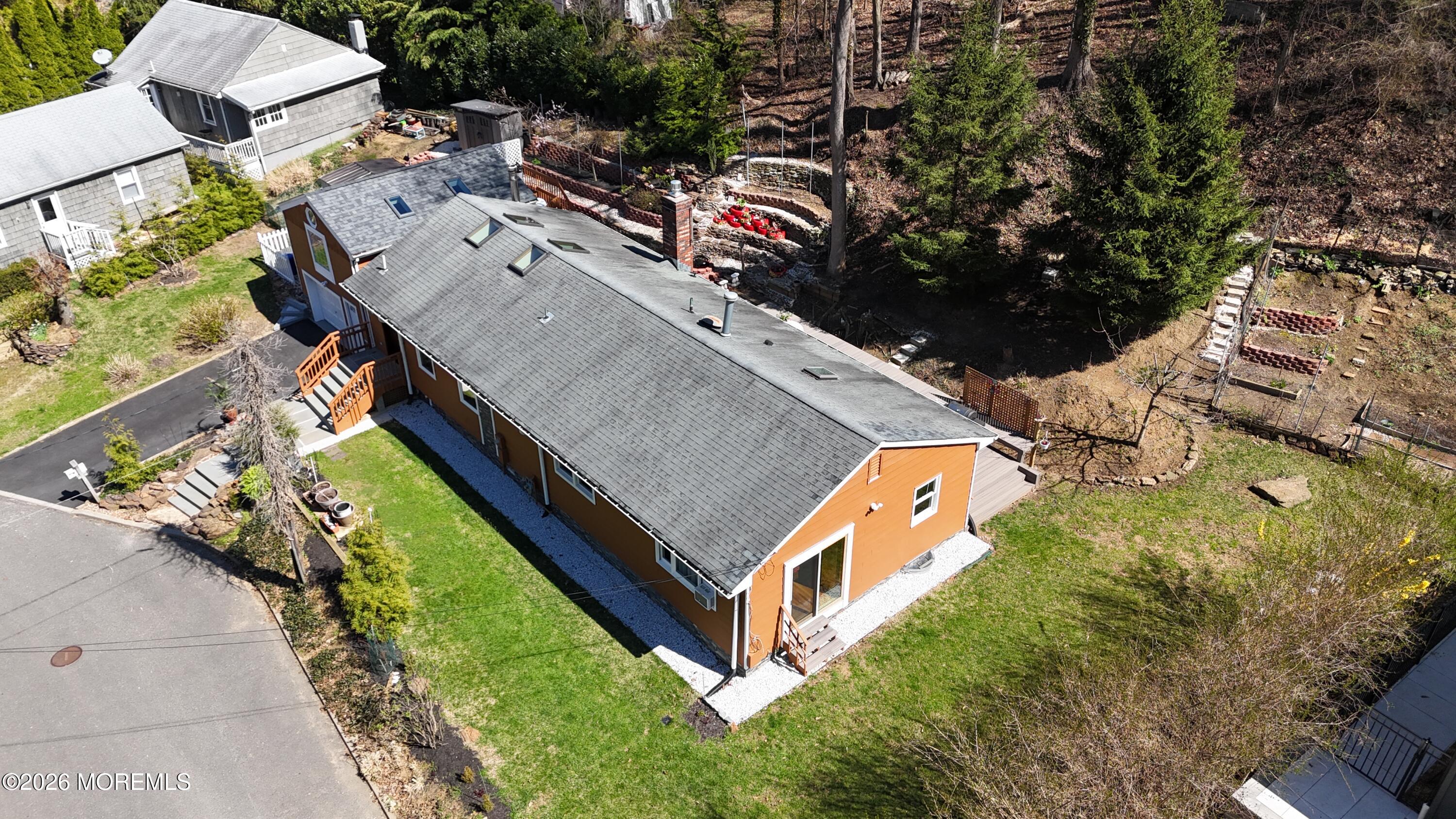 111 Valley Avenue Highlands, NJ 07732 - Photo 36 of 56 an aerial view of a house with a yard