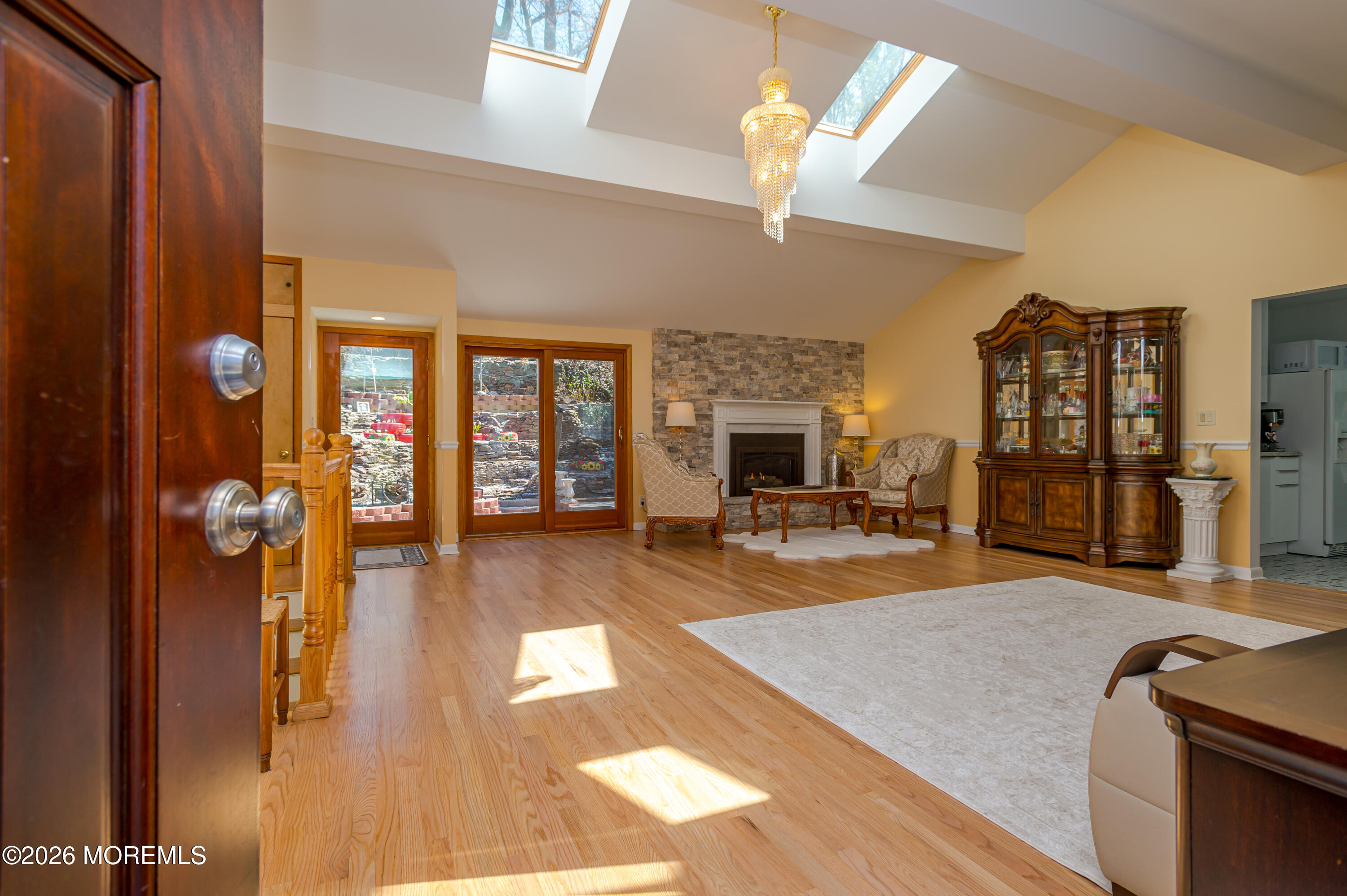 111 Valley Avenue Highlands, NJ 07732 - Photo 4 of 56 a view of a livingroom with furniture a dinning room and chandelier