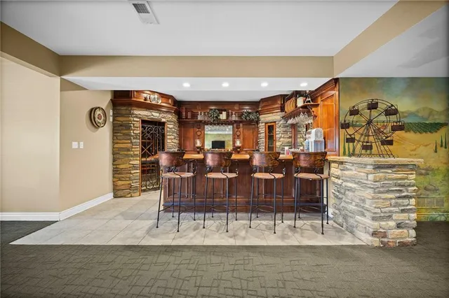 a room with a bed and a flat screen tv