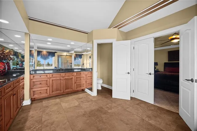 a bed room with a bed and furniture