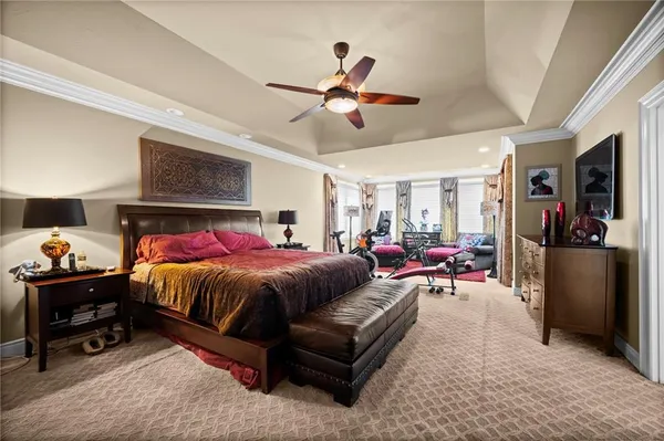 a bed room with a bed and furniture