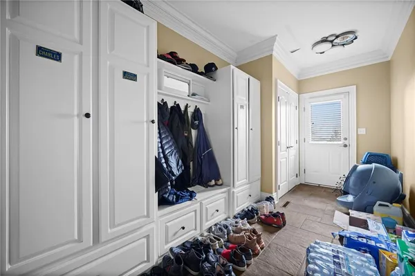 a living room with furniture and closet