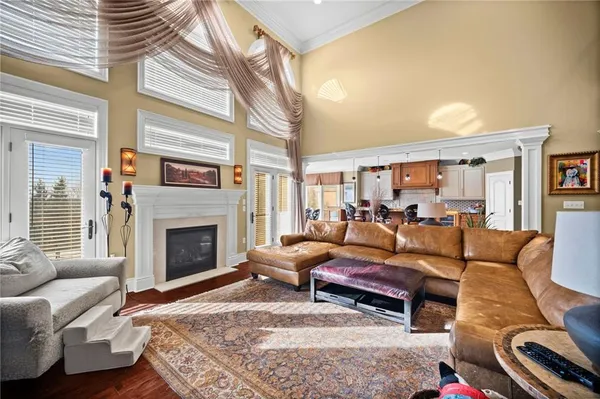 a living room with furniture or couch and a fireplace