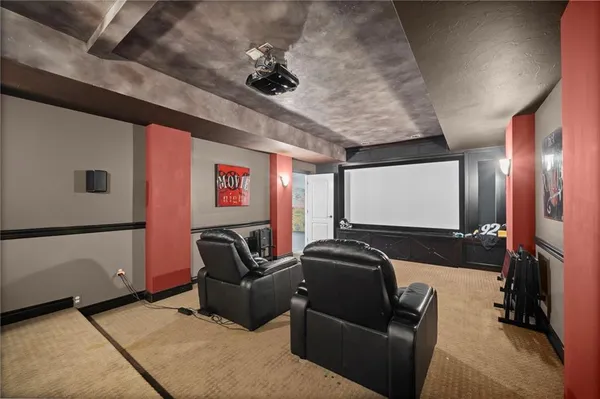 a projector room with a couch