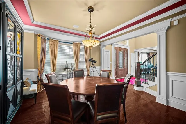 a kitchen with stainless steel appliances granite countertop a stove a sink and dishwasher