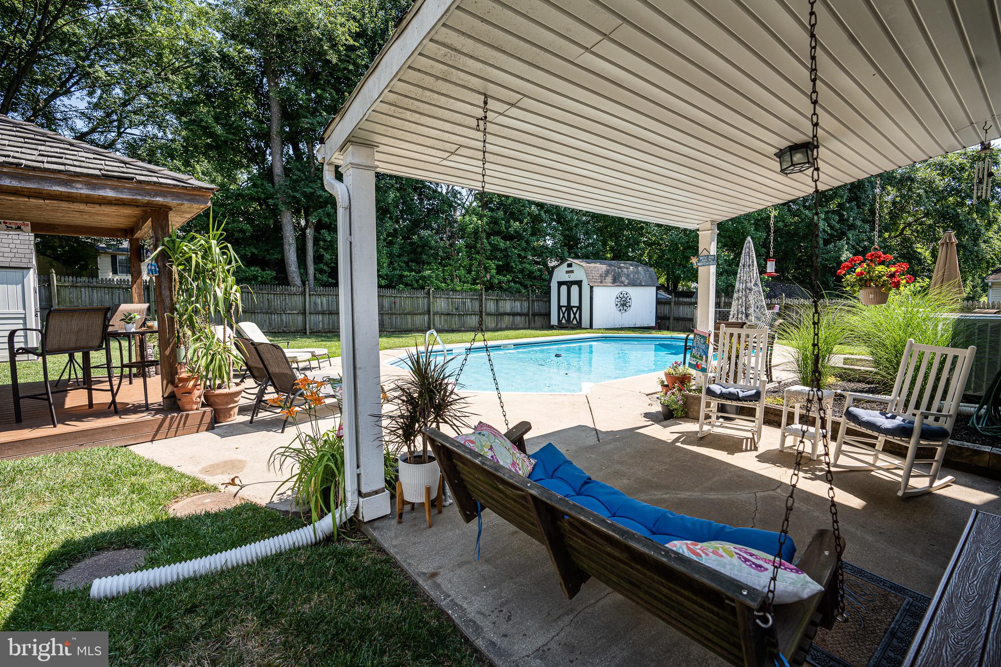23 Yew Road Essex, MD 21221 - Photo 6 of 47 Patio with hanging swing!