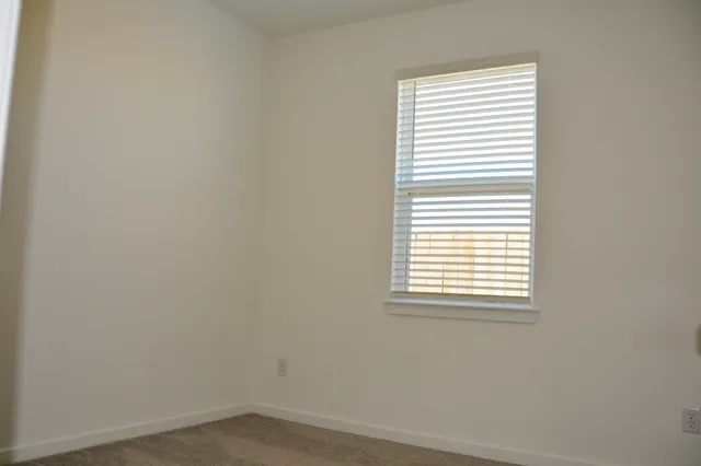 a view of a small space with a window