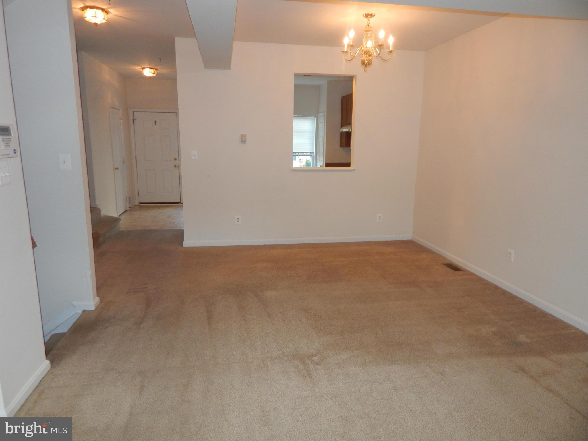 1724 Waltman Road Edgewood, MD 21040 - Photo 14 of 30 wooden floor in an empty room with a mirror