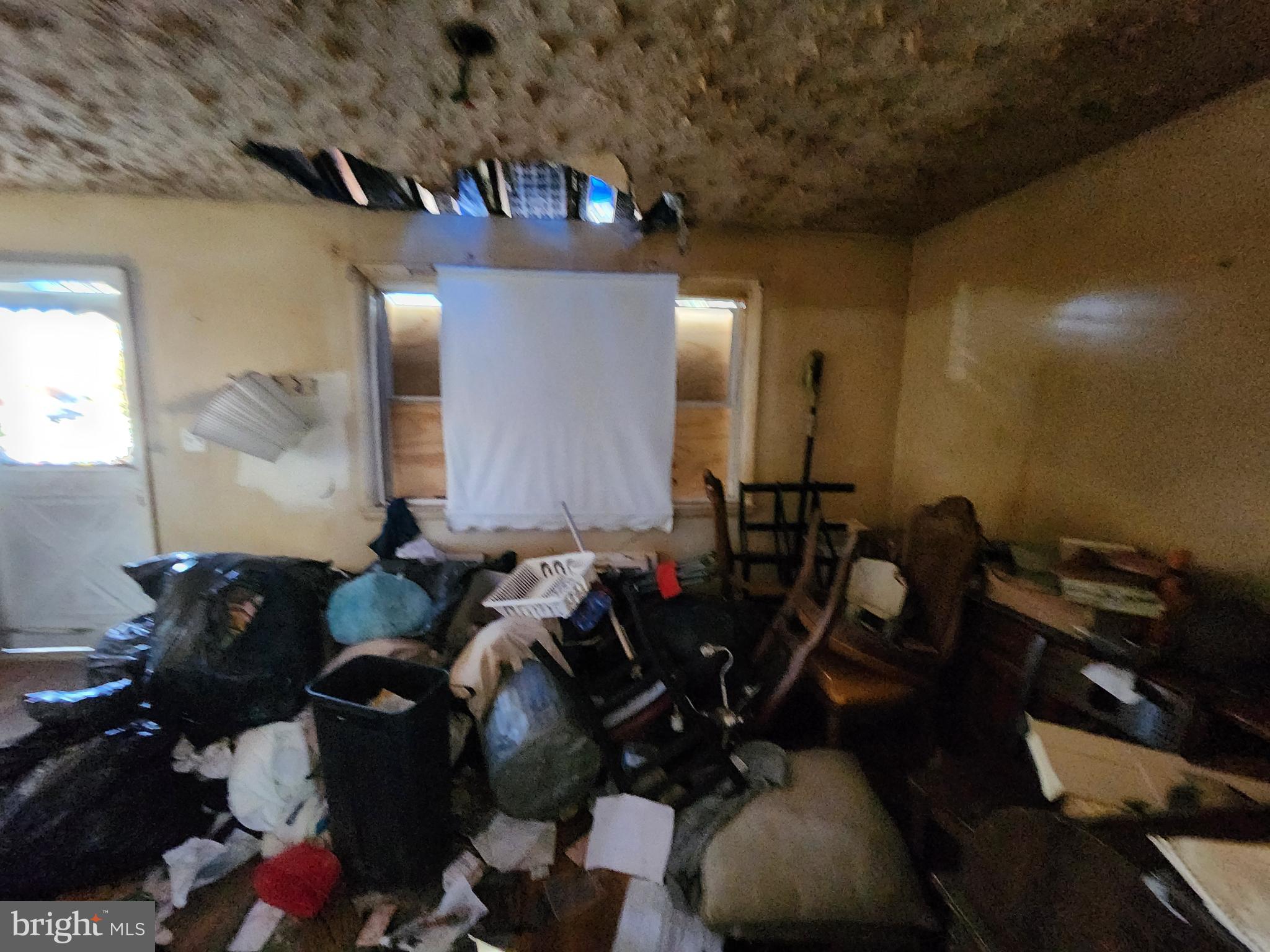 6701 Bessemer Avenue Baltimore, MD 21222 - Photo 5 of 16 a bathroom with a sink and a mirror