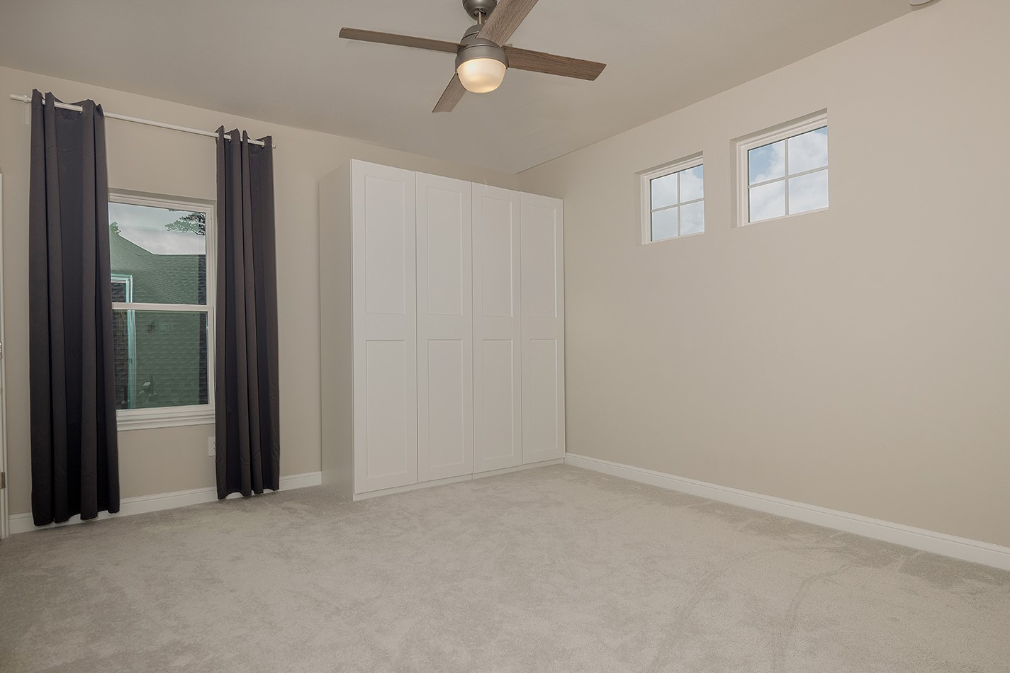 5361 Cherry Spring Drive Spring, TX 77386 - Photo 26 of 35 an empty room with closet and a chandelier fan