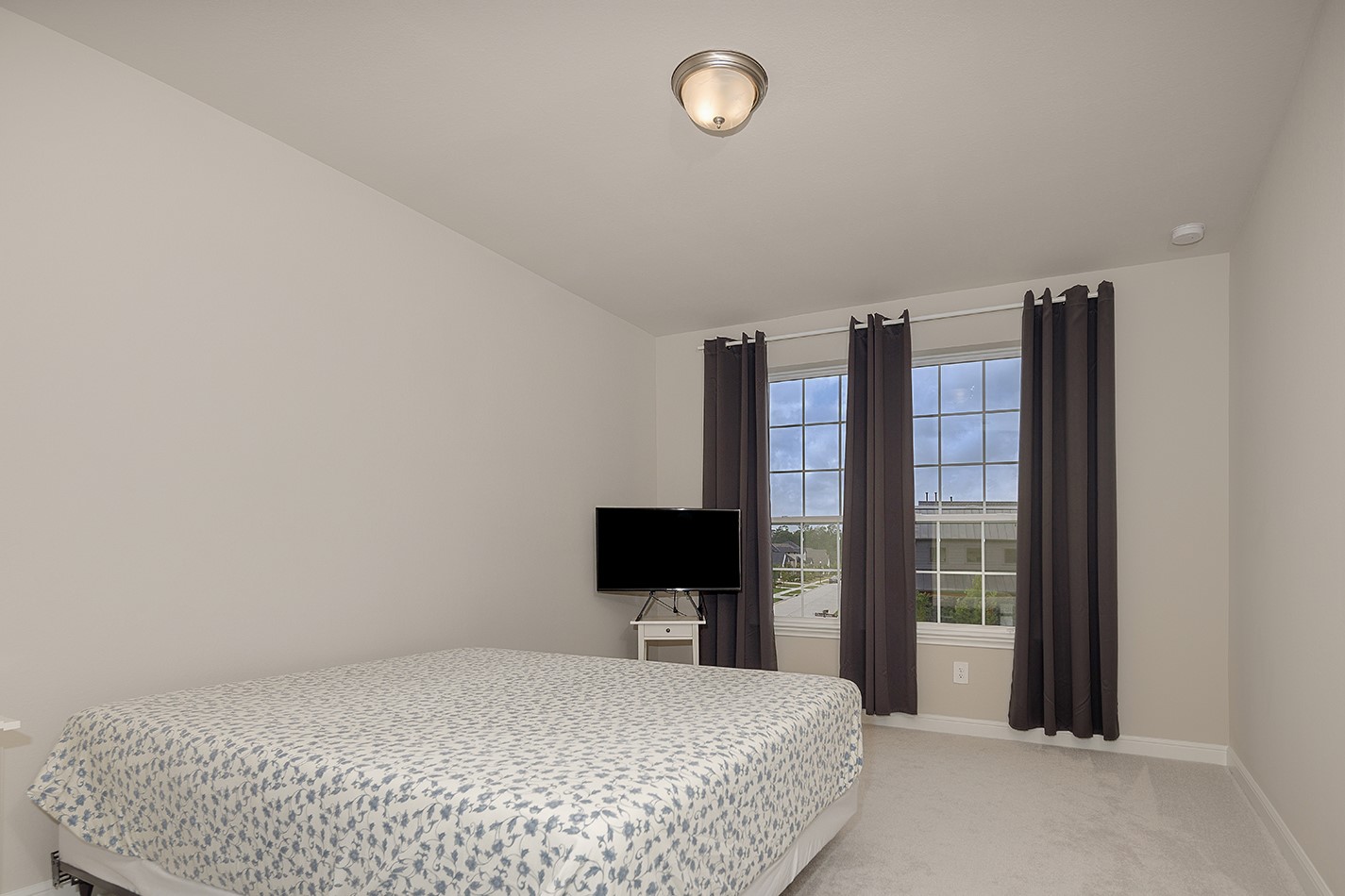 5361 Cherry Spring Drive Spring, TX 77386 - Photo 30 of 35 a bedroom with a bed and flat screen tv