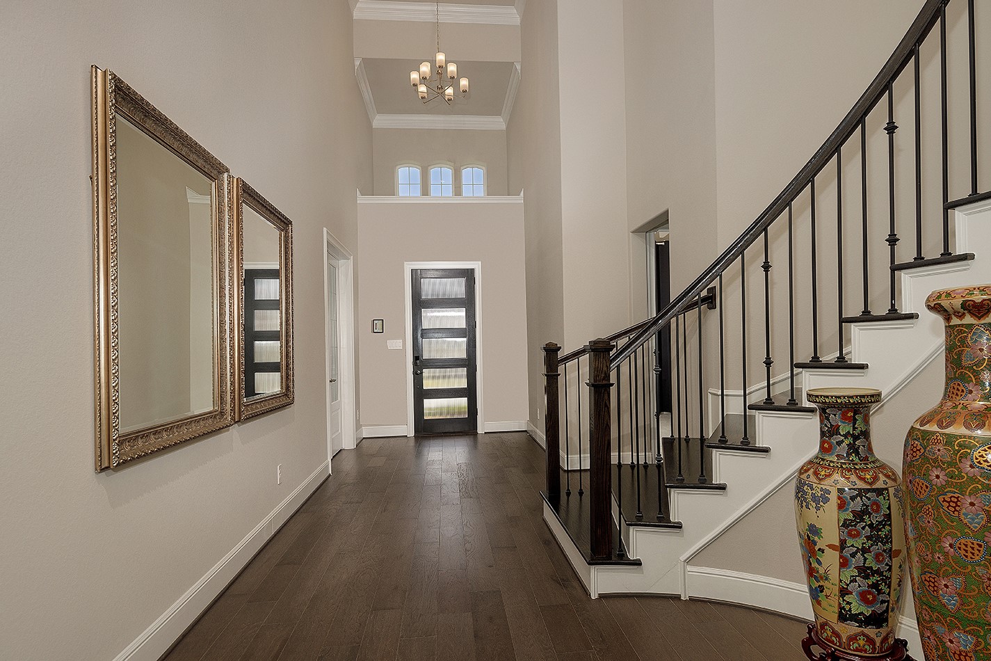 5361 Cherry Spring Drive Spring, TX 77386 - Photo 3 of 35 a view of a hallway with wooden floor and staircase
