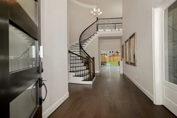 a view of entryway with wooden floor