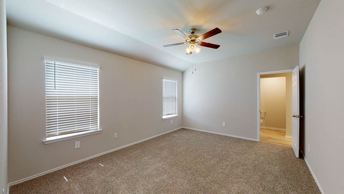 561 Hector Loop Georgetown, TX 78626 - Photo 12 of 30 a view of an empty room with a window