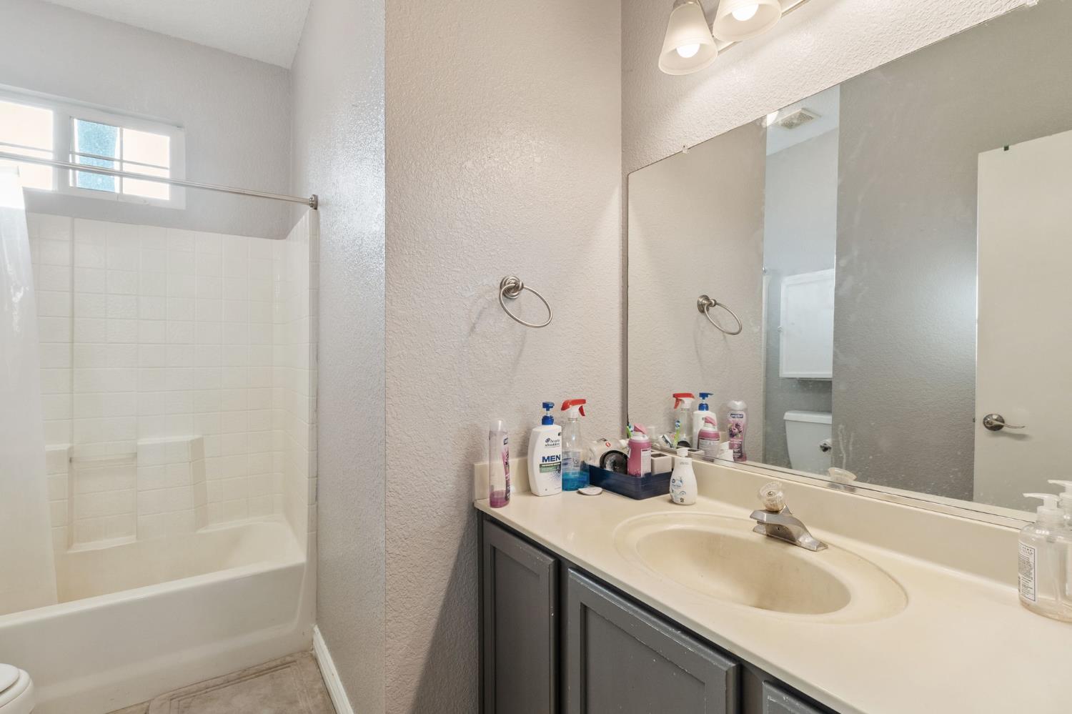 701 Palmer Place Atwater, CA 95301 - Photo 19 of 31 a bathroom with a sink and a mirror