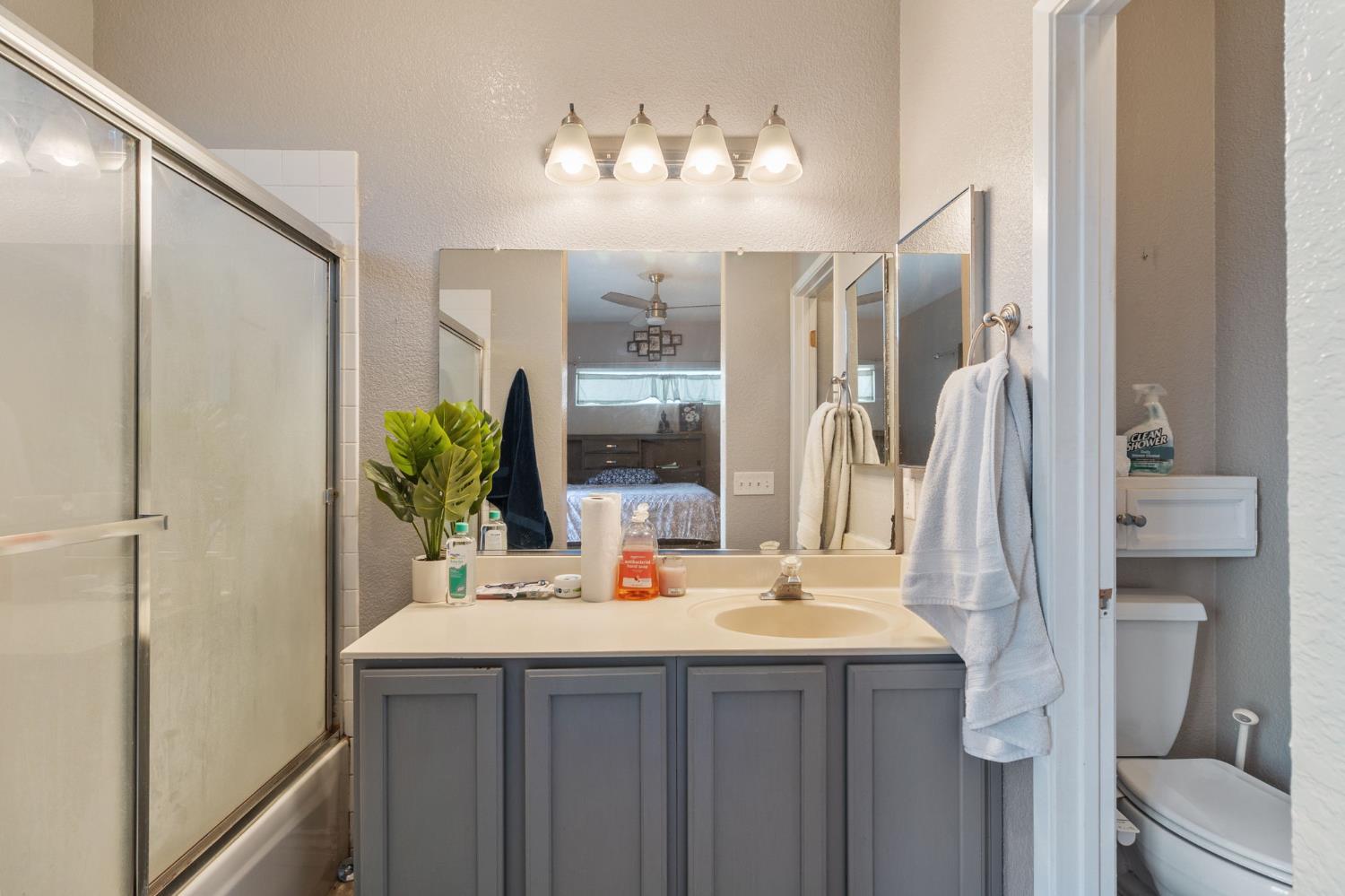 701 Palmer Place Atwater, CA 95301 - Photo 23 of 31 a bathroom with a sink double vanity and a mirror