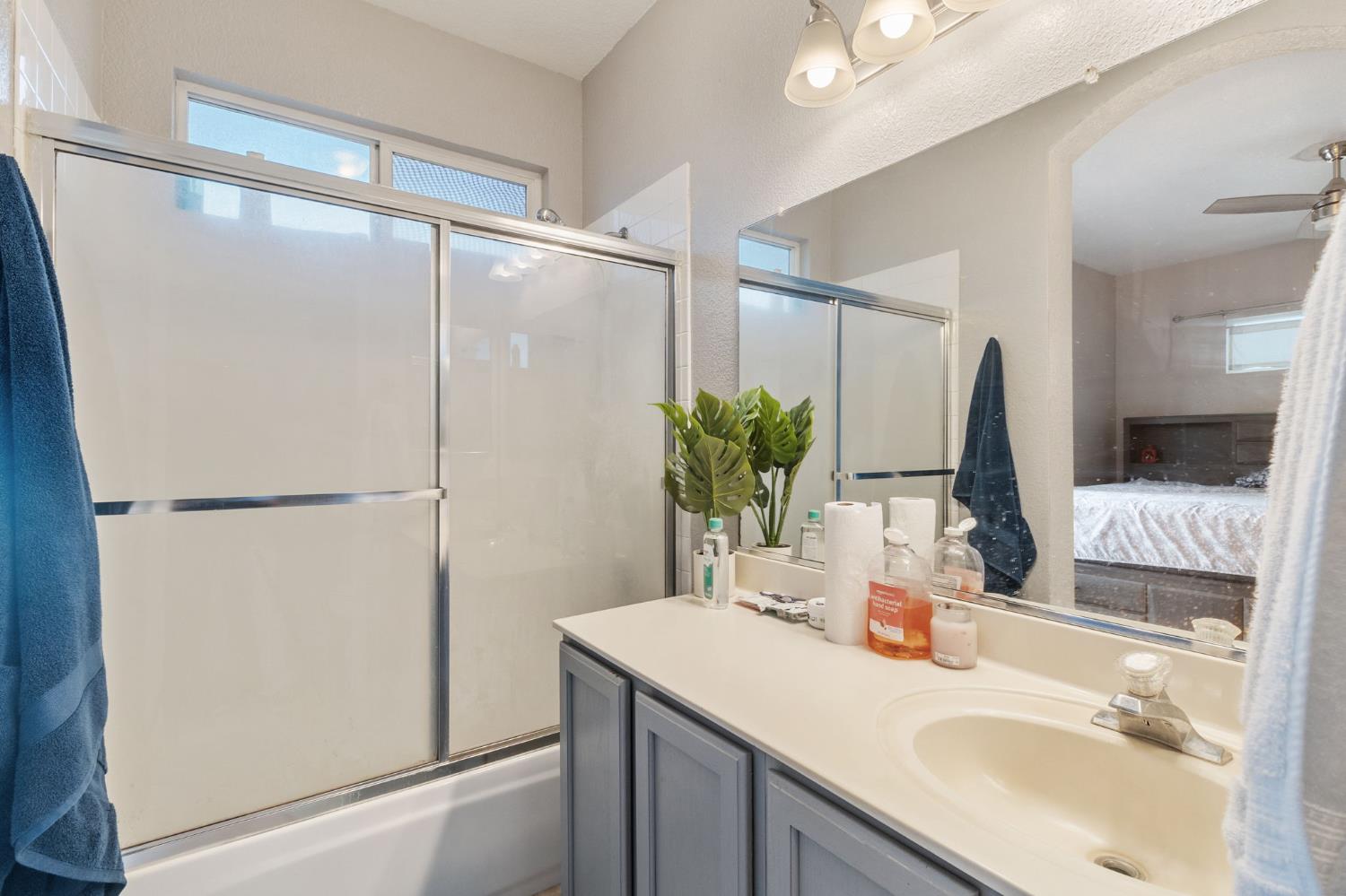 701 Palmer Place Atwater, CA 95301 - Photo 24 of 31 a bathroom with a sink and a mirror