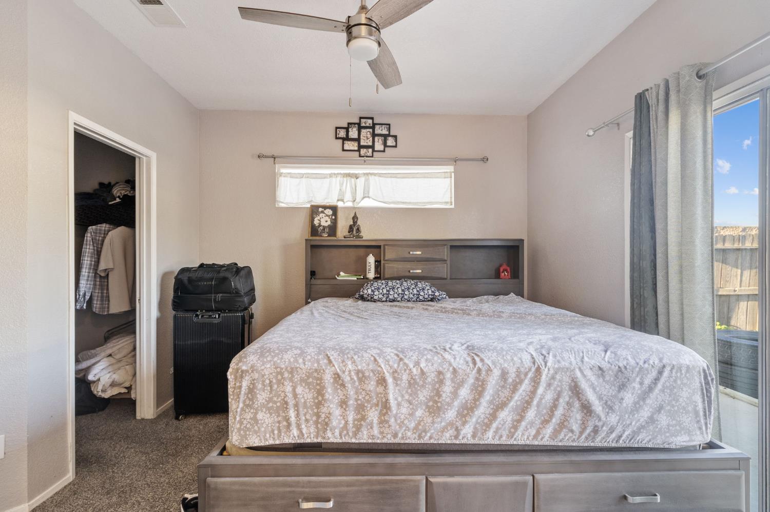 701 Palmer Place Atwater, CA 95301 - Photo 25 of 31 a bedroom with a bed and wooden floor